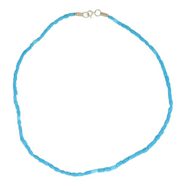 Fraaie helderblauwe turquoise ketting met langwerpige kralen van 4mm breed en 4-6mm hoog en een lengte van 45cm